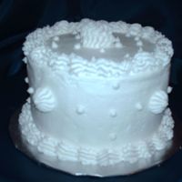 Simply White Customer requested a 6" round lemon cake with white buttercream. She wanted it simple.