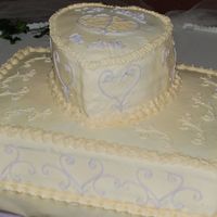 Smith Wedding 1/2 sheet double layer, torted chocolate cake with raspberry filling. This was a wedding for 100. My first wedding order!!!!