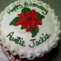 Poinsettia Birthday Cake Red Velvet 6" birthday cake with cream cheese icing torted. I did the poinsettia freehand--not the best job, but I'm getting...
