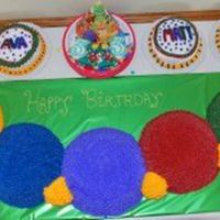 Baby Einstein Caterpillar Done for my two sets of twins. One set turning "1", the other set turning "3". The smash cakes are 6in. rounds (yellow...