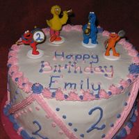 Img_0028.jpg Sesame Street Band. White cake with Choc. Chip Milk Choc. pudding. IMBC icing