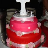 Confirmation Cake I had made for my neice's confirmation . Top cake is a red velvet cake with cream cheese frosting and filling and covered in pink...