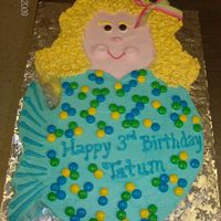 Mermaid This little girl just wanted a mermaid cake. I gave her blonde hair to match. Fun cake to do. I used m&m's for the scales.