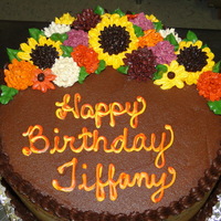 Fall Flowers Mocha cake with chocolate icing, and fall flowers for an adult birthday.