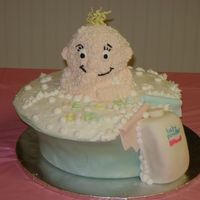 Baby In Tub This cake is completely edible. 5 separate cakes make this one... 3 in the pot, one for the baby, and one for the powder bottle. This is by...