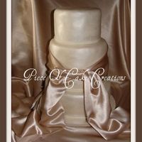 Champagne Wedding Cake This is probably one of my most favorite wedding cakes. Three tiers all white chocolate macadamia nut with a whipped white chocolate mousse...