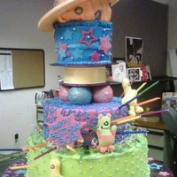 Out Of The World bad quality pic taken w my cell phone. the top tier and saturn were spinning with the wilton rotating cake base.