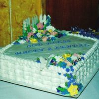 My Daughters And Nieces Baptisim Cake all buttercream except for the butterflies and fence, they are color flow. I don't think that I realized to use royal icing then for...