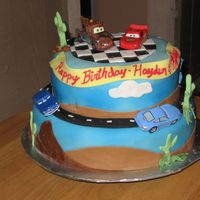 Disney Cars My first ffm, I loved making it. I got a lot of inspiration from the other cakes on this site. This was a 2 tiered cake top was white with...