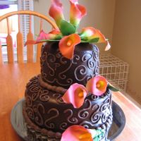 My First Poured Ganache Chocolate cake, whipped ganache filling, poured ganache, chocolate buttercream decor, airbrushed gumpaste calla lillies