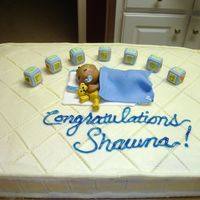 Sleeping Baby On Mattress buttercream frosting with mmf decorations. This was my first attempt at fondant figures