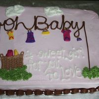 Baby Clothes On Line Fondant baby clothes and fondant blankets in "basket" - all else is buttercream. I got the idea from Amylou - hers is for a boy...