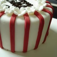 Red Stripes With White Flowers Bday Cake 