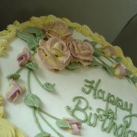 Two-Tone Rose Birthday Cake Buttercream with yellow/pink roses.