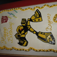 Bumblebee Transformer Cupcake Cake Sorry for the terrible photo, it's from someone elses camera. Hope to add better photos later.Cupcake cake with buttercream frosting...