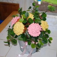 Cupcake Bouquet Cupcake Bouquet for Mother's Day. The cupcakes are strawberry with cream cheese icing.