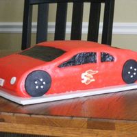 Matchbox Car Chocolate 9x13 carved down to the car. Covered in MMF and with windows that are BC.