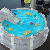 Pool Party I just made this cake for a boy who had his birthday party at his house in his pool!! The slide and everything you see is edible except for...