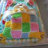 Baby Christian my proudest part of this cake is the baby quilt, made with fondant then top with star-tip icing :P