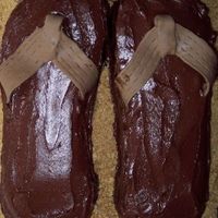 Boys Flip Flop Cake I have seen tons of girly flip flop cakes, but wanted one that was appropriate for a boy. I used my sons sandals as a model for these...