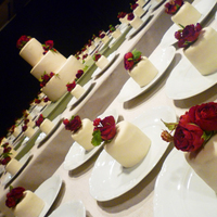 The Weddingcake Is Decorated With Red Roses Spray Roses Arctic Bramble And Raspberry Twigs And The Mini Weddingcakes Were Decorated With The weddingcake is decorated with red roses, spray roses, arctic bramble and raspberry twigs. And the mini weddingcakes were decorated with...