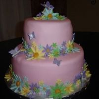 Flowers And Butterflies This was for a baby shower. She really wanted butterfies. The butterflies are purple, dusted with pearl dust.