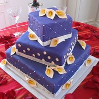Purple Square Wedding Cake this one terrified me, but it turned out great. Bride wanted flowers on the middle section for whimsy and boy, I think I might fall in love...