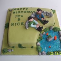 Fishing Pals sponge cake, with piping gel for the water mixed with a little blue food colouring.