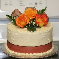 Fresh Roses I made this for my MIL. She loves cake, and told me all she wanted was a butter cake with bavarian creme for her birthday. Again, I got the...