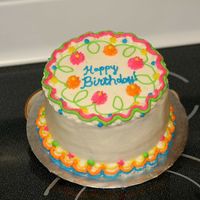 Bright Colored Cake Small buttercream cake I made for my sister for her birthday. I wanted something colorful and "happy"!