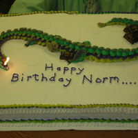 Fire Breathing Dragon This was so fun to do..... all buttercream..with candy treasure chests.