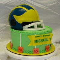 Fooball Helmet - Michigan buttercream, fondant, choc/choc chip with choc/choc chip