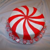 Peppermint Candy This was based on a picture of one of my mom's old cakes, but with fondant instead of buttercream stars. "Wrapper" will be...