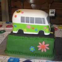 Vw Bus Cake for a 40th birthday party with a 1969 theme. Chocolate stout cake with ganache, covered in fondant with fondant decorations. The base...