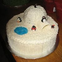 Igloo And Penguins I had lots and lots of help with this cake by my two kids. They made the fondant penguins, helped make and frost the cake and of course art...