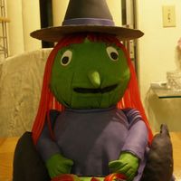 Halloween Witch Wondermold and sportsball pans. Cake covered with fondant.