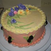 Blue Tulip this is rasberry cake with gumpaster tulips and butter icing