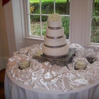 White And Silver Buttercream, swirls are hard to see in this photo. Fabric ribbon border.