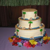 Beach Theme Wedding Cake This cake was for a beach themed wedding. Not my idea of a wedding cake, but the bride and groom loved it. The shells are candy melts...