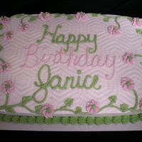 013.jpg Cake is decorated in BC. The background design was done with a paper towel.