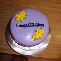 Ecu Gradusation East Carolina University graduation cake. Chocolate with choc SMBC, wrapped in MMF. Decorations are fondant as well. The cake had a satin...