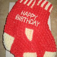 Red Sox This was for a Red Sox fan. Yellow cake with almond-rum icing.Red was piped in rows of shells to resemble 'knitted rib' look....