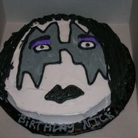 Ace Frehely Kiss white 9-inch round with buttercream icing. my cousin loves KISS so i did all 4 members the best i could.