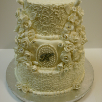 25Th Anniversary Cake 10,8,6 with bc. Roses are gp. Some have 'jewels' in them. Lemon w/ lemon curd bc, strawberry with strawberry bc, choc w/ peanut...