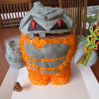 Lego Power Miners Rock Monster This is my son's 8th birthday cake, a Lego Power Miners Rock Monster. The Lego mini fig monster Fireox is standing beside it. Cake...
