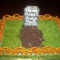 Graveyard buttercream grass, pretzel fence,and graham cracker tombstone. enjoy