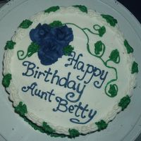 Birthday Cake This is one of my first cakes with roses (i am NOT a flower person). It was a chocolate cake with triple chocolate fudge icing(betty...