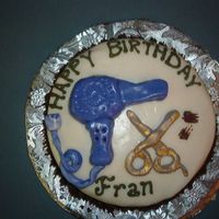 Hairstylist Cake This was for my hairstylist. It was my first cake with BC fondant....the border is hair ( i think i love tip 233 a little too much)