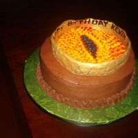 Lord Of The Rings.-The One Ring This cake was done for our best friends. They're really into Lord of the rings. The ring is fondant painted with luster dust. the cake...