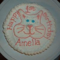 Kitty Cake this is the first cake i ever did for someone outside the family. her daughter LOVES Kitties. It is a white cake with strawberry...